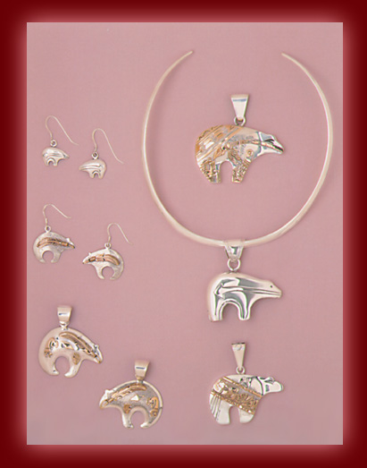 Sterling Silver and Gold Bear jewelry in Pendants, and Earrings.