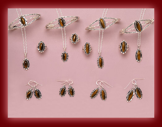 The gemstone Tiger Eye is mounted on silver jewelry settings of pendants, necklaces, earrings, rings, bolas, bracelets, belt buckles, and watch tips.