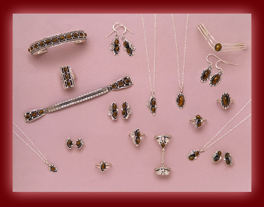 The gemstone Tiger Eye is mounted on silver jewelry settings of pendants, necklaces, earrings, rings, bolas, bracelets, belt buckles, and watch tips.