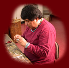 A Navajo silversmith from Skystone Creations fashions jewelry from Sterling Silver.
